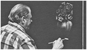 bill at the easel painting a vase of roses on a black canvas